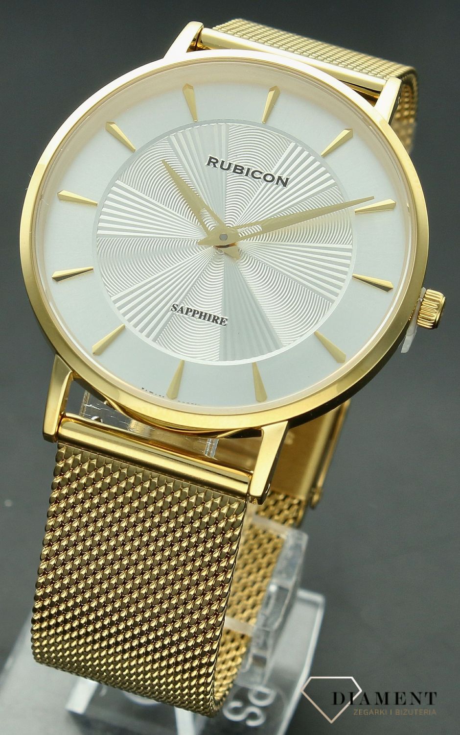 Zegarek damski Rubicon złoty z szafirowym szkłem RNBD76 złoty-srebrny-promienie. Zegarek damski na bransolecie. Zegarek damski Rubicon z indeksami. Zegarek damski biżuteryjny Rubicon. Elegancki zegarek w złotym kolorze na prezent..jpg